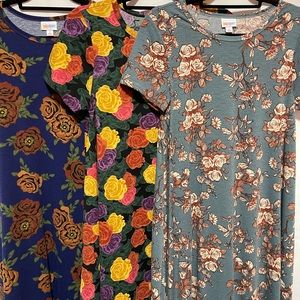 LuLaRoe three floral small Carly’s.  New with tags